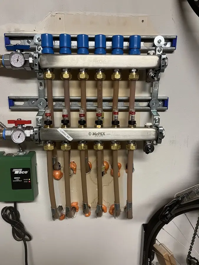 Plumber performing Leak Detection at a residential property in Gravette